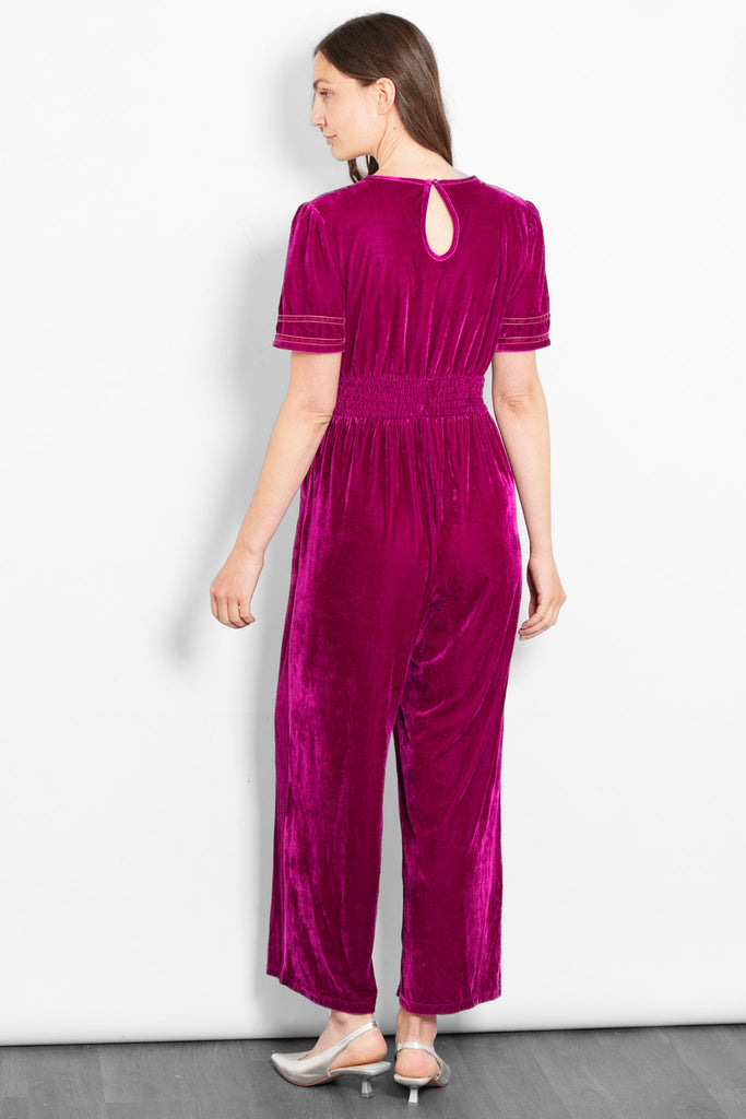 lydia-v-neck-jumpsuit-berry-velvet-model-rear-view-button-fastening