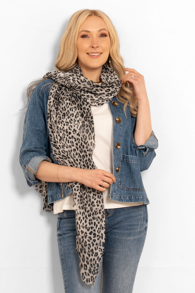 odessa-lightweight-scarf-white-leopard-print-model-draped-loosely