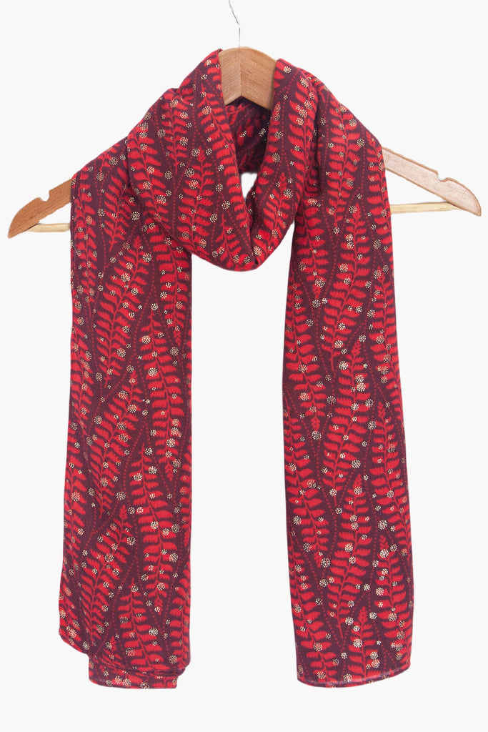 clover-red-fern-leaf-lightweight-scarf-draped-on-coat-hanger