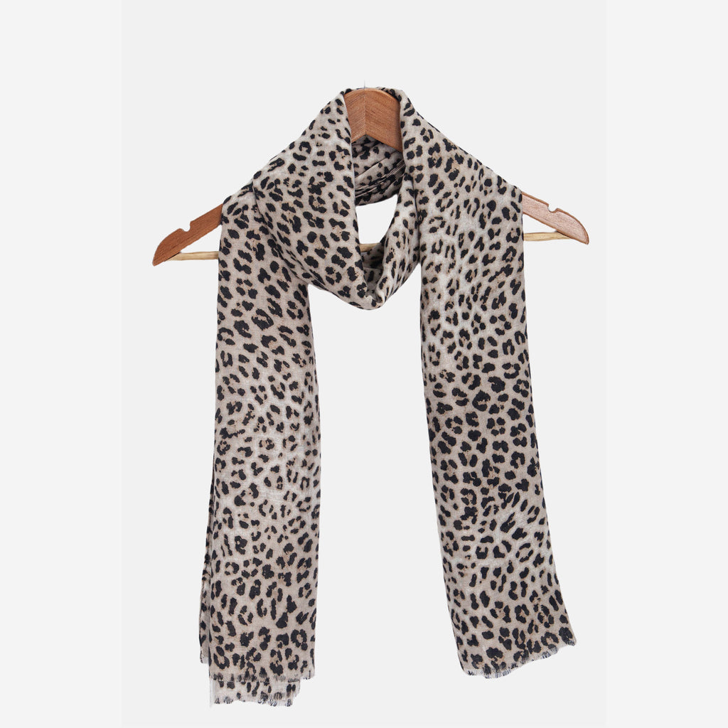 miley-white-leopard-lightweight-scarf-draped-on-coat-hanger