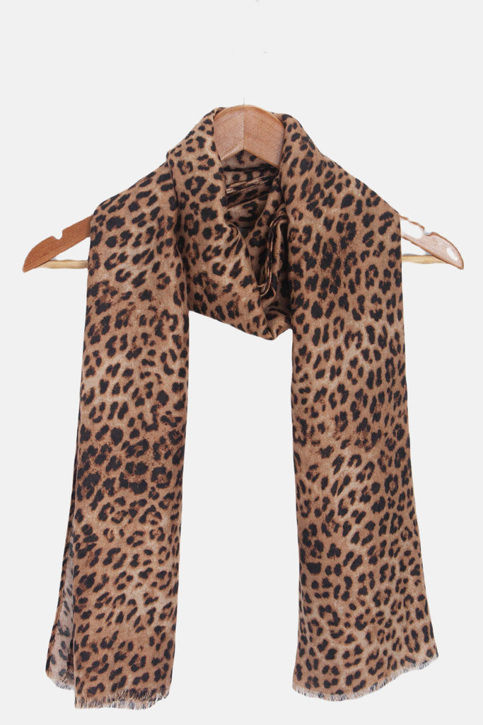 miley-neutral-leopard-lightweight-scarf-draped-on-coat-hanger