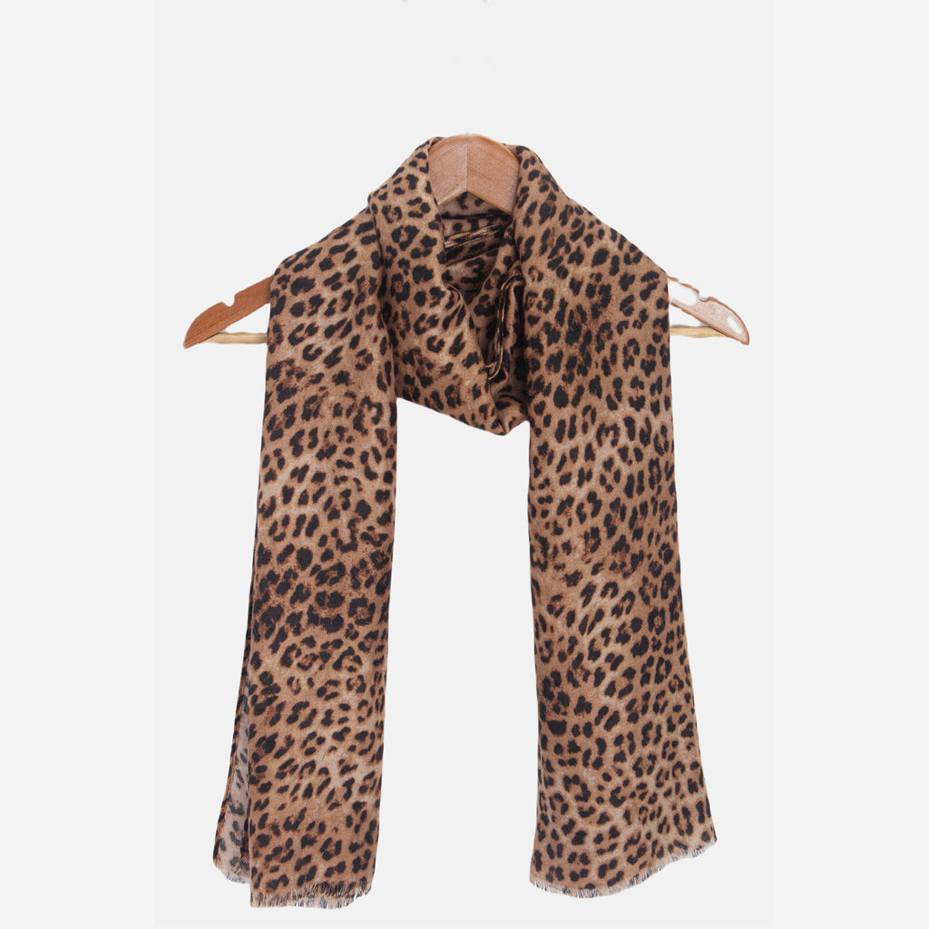 miley-neutral-leopard-lightweight-scarf-draped-on-coat-hanger