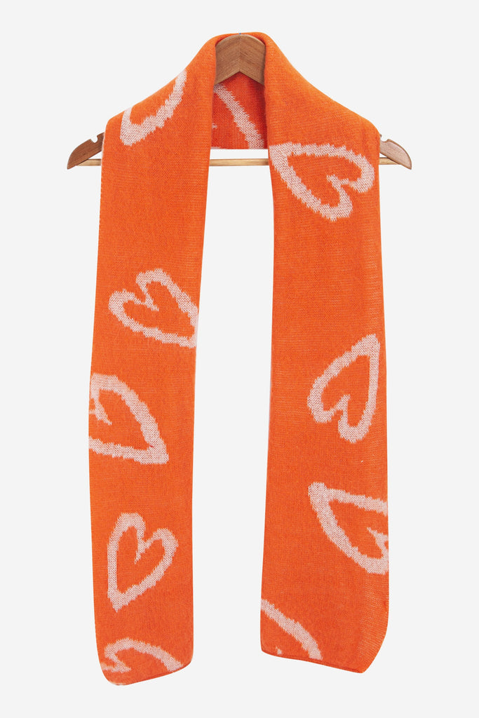 zuri-cream-orange-sketched-hearts-heavyweight-scarf-draped-long