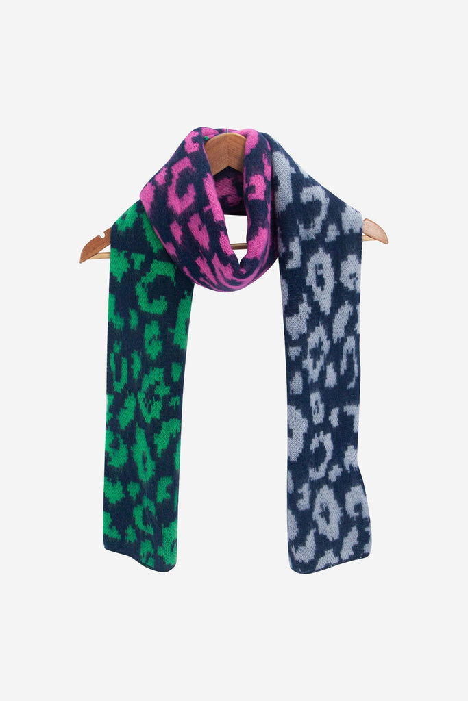 kyra-navy-blue-leopard-heavyweight-scarf-draped-on-coat-hanger