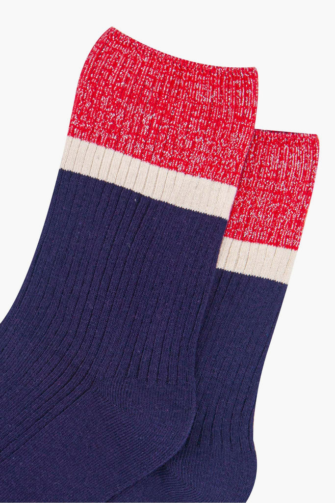 womens-mid-calf-socks-navy-blue-red-contrast-cuff-close-up-material