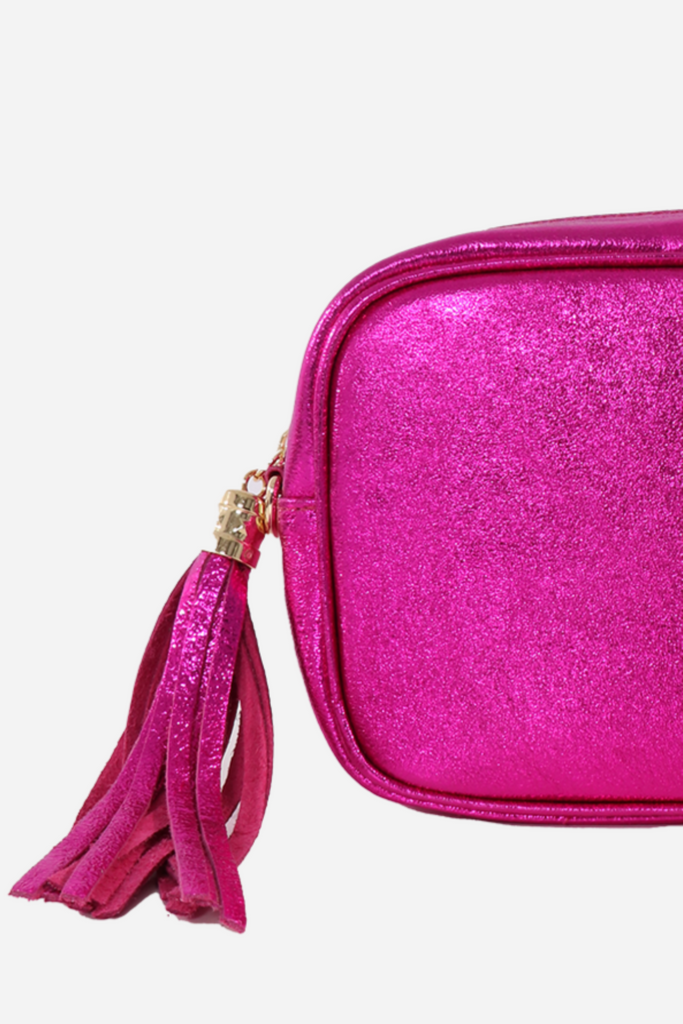 close up of the shiny pink metallic leather of the bag