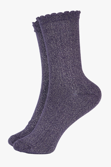 navy blue ankle socks with a scalloped edge and an all over silver glitter sparkle