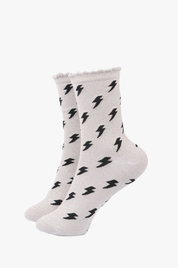 grey ankle socks with an all over pattern of black lightning bolts and a silver glitter sparkle