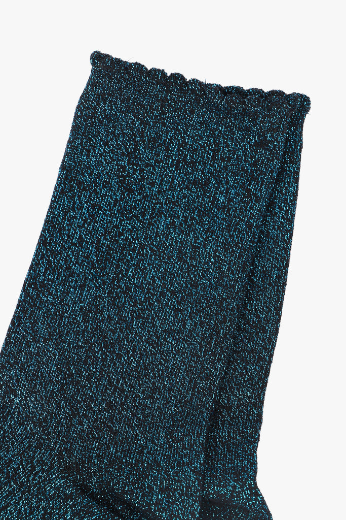 close up of the turquoise glitter sparkle on the cotton ankle socks