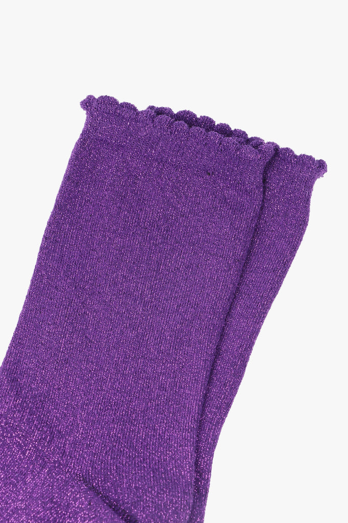 close up of the silver glitter sparkle on the purple socks