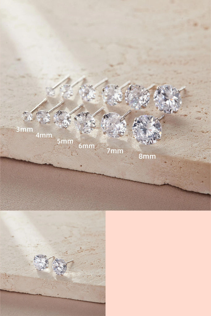 white cz crystal sparkly round stud earrings set in s925 sterling silver, these are available in sizes 3mm, 4mm, 5mm, 6mm, 7mm and 8mm as shown