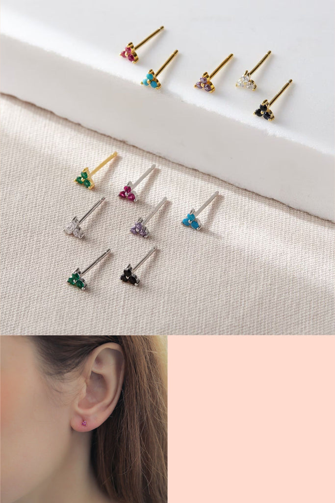 small cubic zirconia stud earrings three stones in a triangular shape set in sterling silver, these are dainty stud earrings