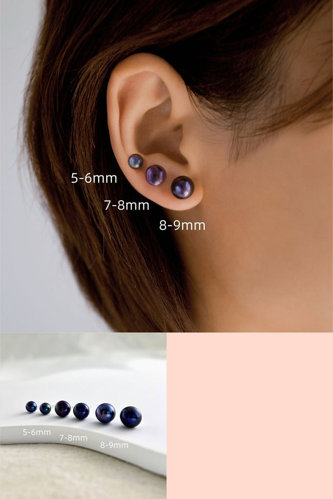 model wearing three sizes of black freshwater pearl studs earrings with sterling silver pins