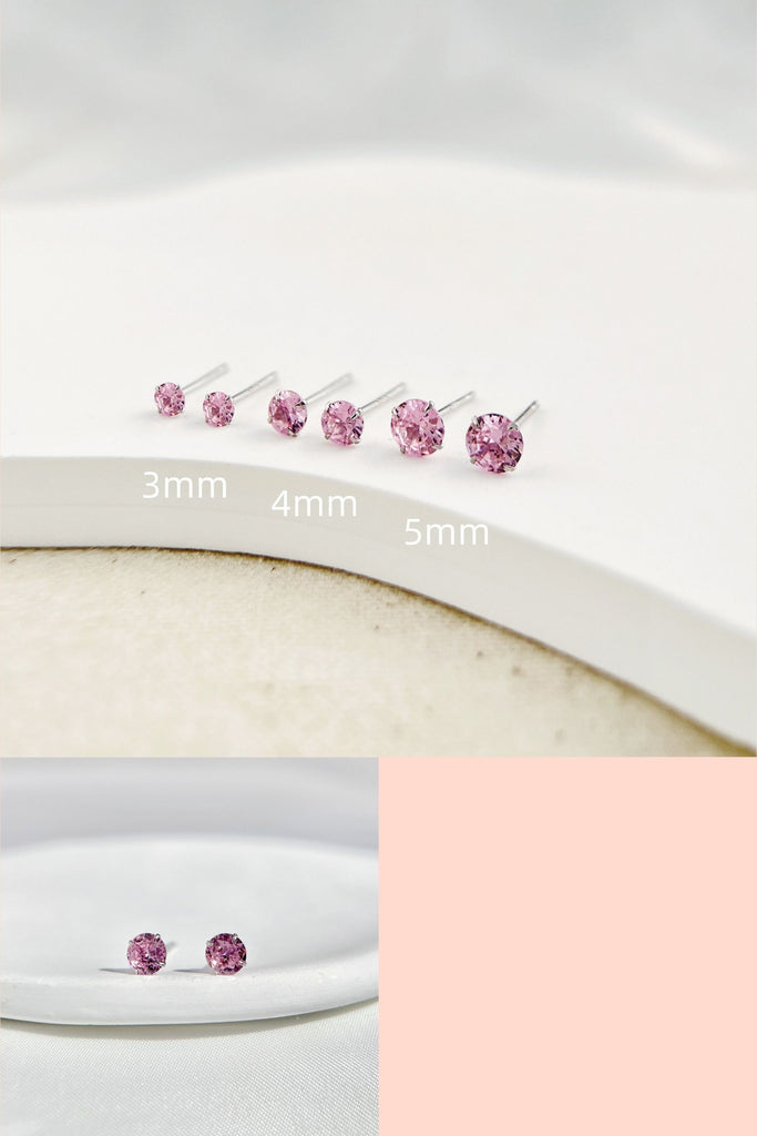 round pink cubic zirconia stud earrings set in sterling silver, available in 3mm, 4mm and 5mm diameter