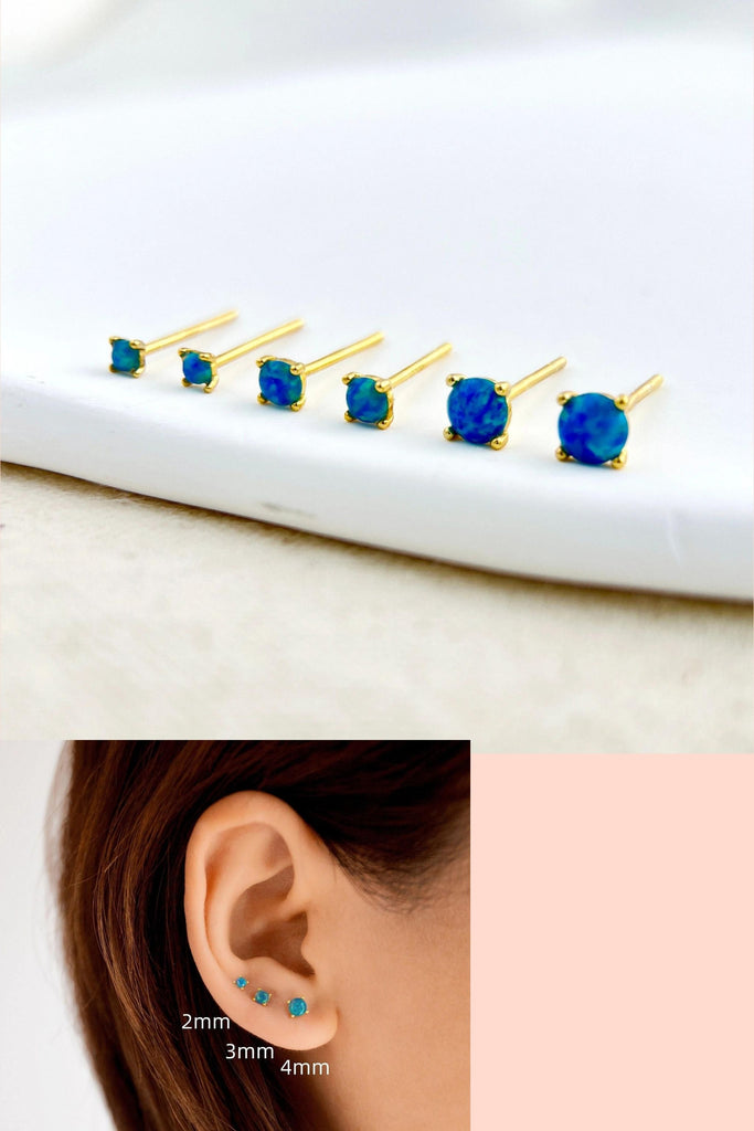 showing three sizes of round opal stud earrings in blue and teal, the opals are mounted on gold plated S925 sterling silver and are available in 2mm, 3mm and 4mm diameter