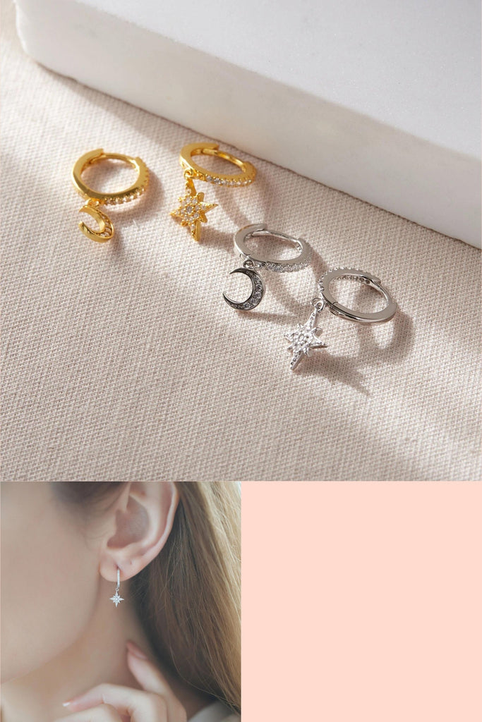 asymmetric sterling silver and cz dangle hoop earrings, each pair has one star and one moon charm which dangles below the earlobe