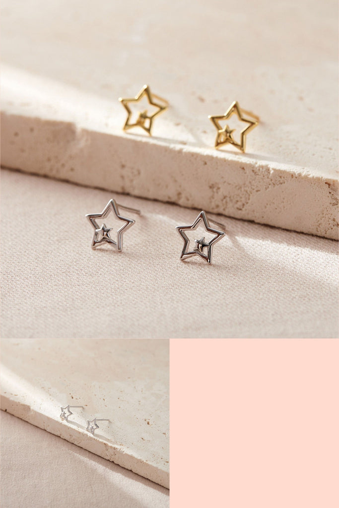 sterling silver openwork star stud earrings, one small solid star surrounded by a larger 8mm open five pointed star