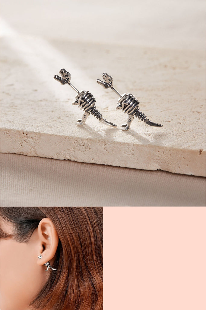 sterling silver t-rex dinosaur ear jacket earrings, the head of the dinosaur goes on the front of the earlobe and the body on the back of the earlobe