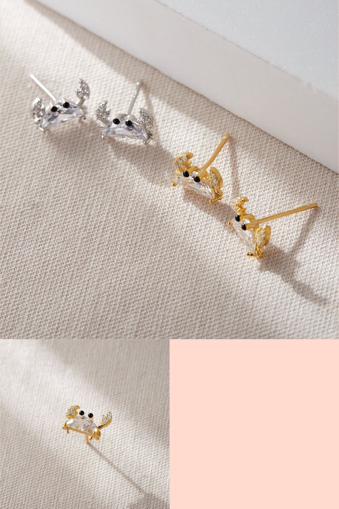 sterling silver and clear cz stud earrings designed to look like crabs