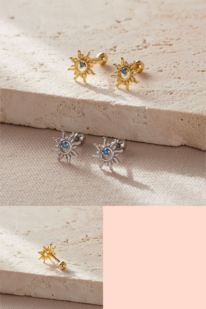 silver and gold plated silver sun shaped cartilage stud earrings with ball back fastenings