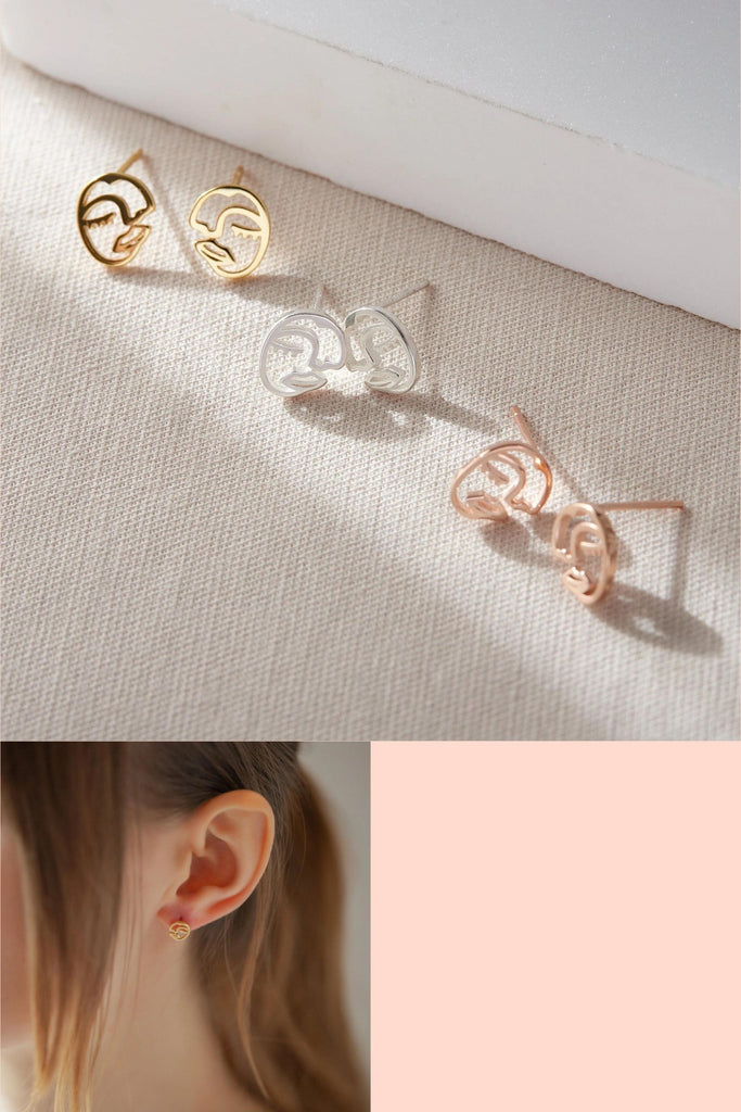 three pairs of face outline stud earrings in silver, gold and rose gold, the faces are like picasso faces, slightly obscure