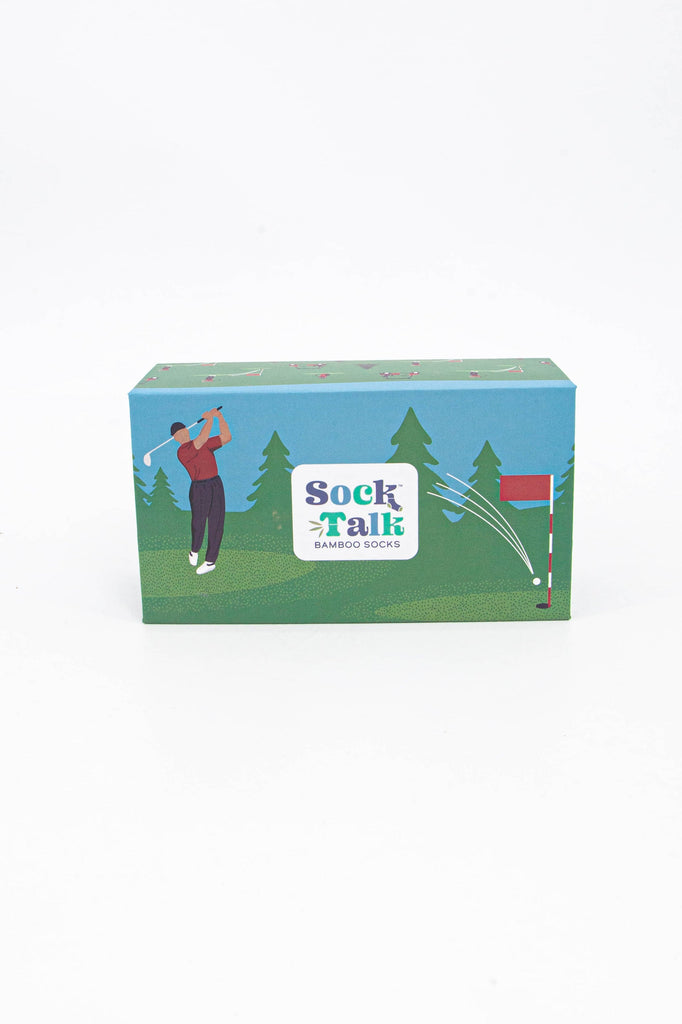 green and blue sock gift box featuring a golfer on the green