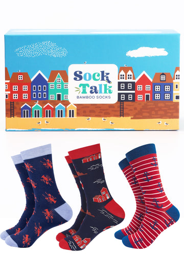 nautical themed bamboo socks gift set, three pairs of sock with anchors, lobsters and a seaside village in an artistically designed gift box