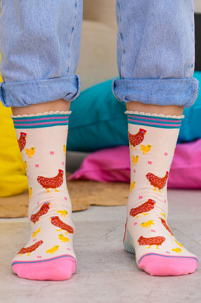 hen and chicks socks worn by a model