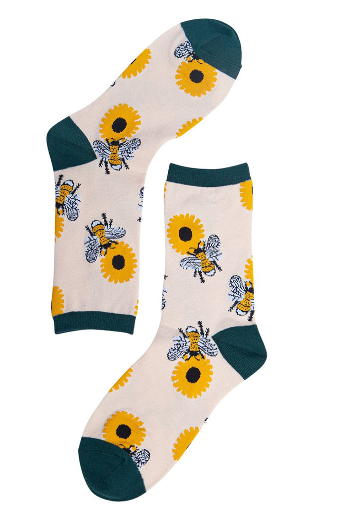 close up of the bee and sunflower bamboo socks 