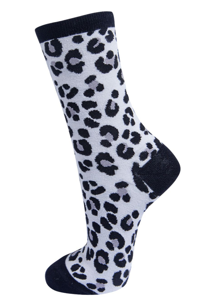 grey and black leopard print socks with black  heel, toe and cuff