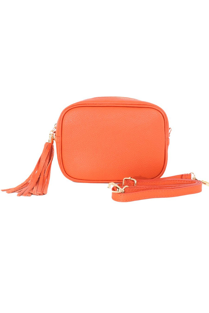 orange pebbled leather crossbody camera bag with detachable bag strap
