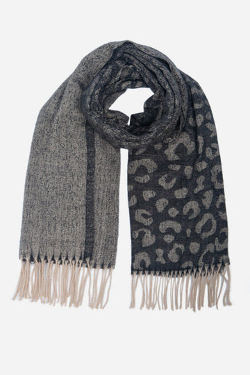 black and grey winter scarf with a black leopard print pattern