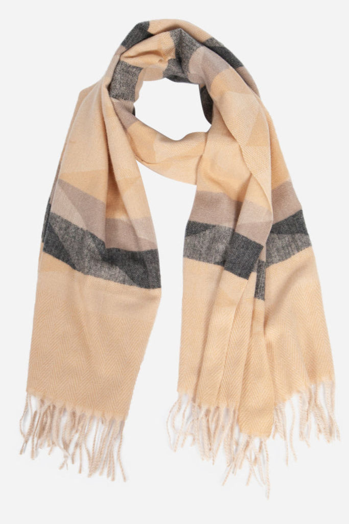 light camel beige winter scarf with a black an beige aztec print pattern