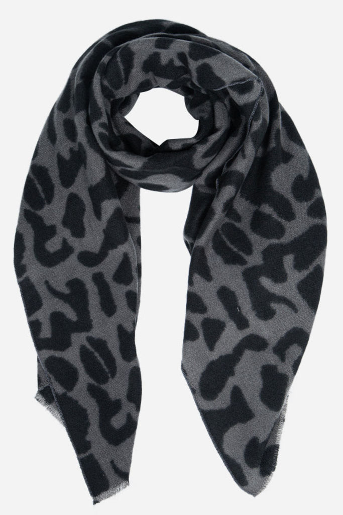 a grey and black abstract print blanket scarf