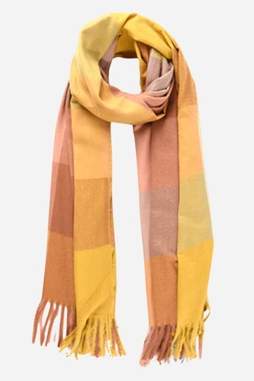a multitoned mustard yellow check pattern winter blanket scarf with tassel trim