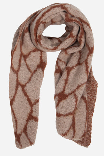 winter scarf with a giraffe print pattern in neutral beige colours