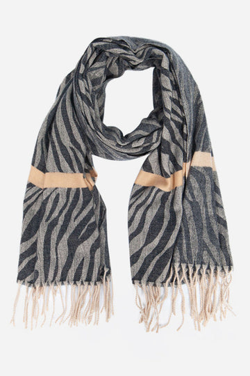 black and beige zebra print blanket scarf with beige horizontal sripe and a tassel trim edge