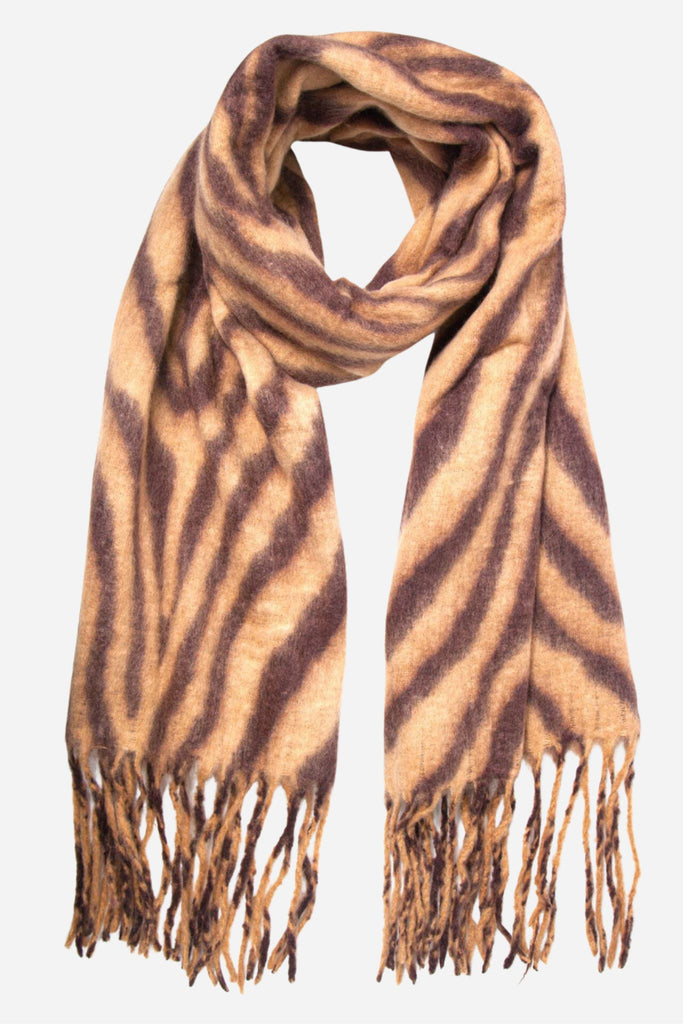 a neutral camel winter scarf with an all over tiger print pattern