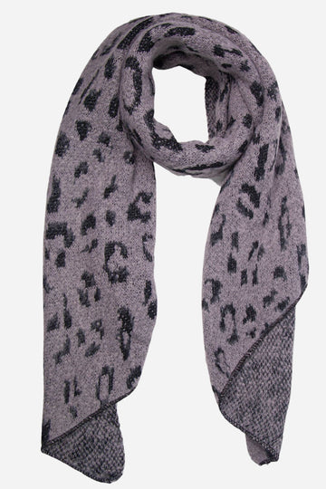 grey asymmetric blanket scarf with a black glitter leopard print pattern