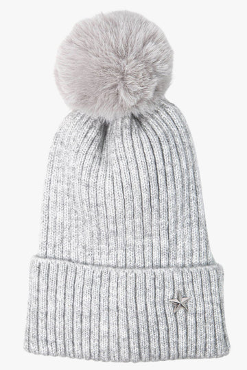 grey winter pom pom bobble hat with a silver metal star motif on the rim