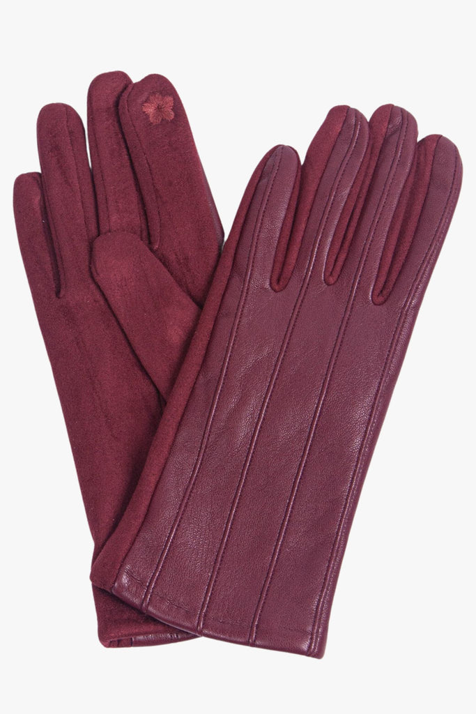cranberry coloured faux leather winter gloves with ribbed stitching on the back and a touchscreen responsive index finger detail