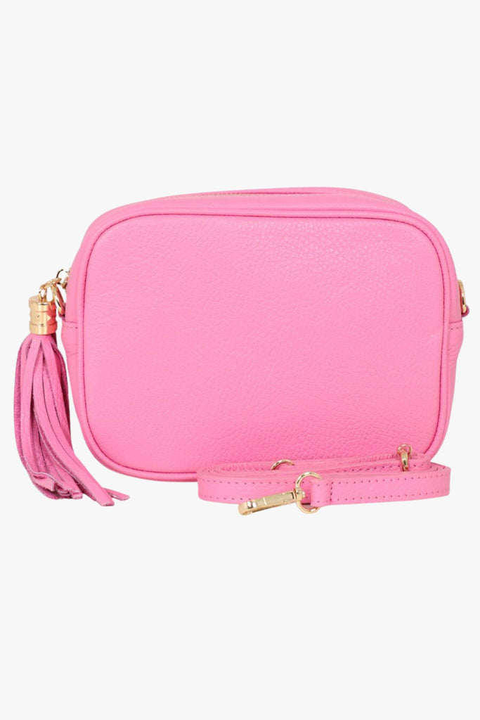 hot pink leather crossbody bag with matching detachable bag strap