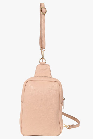 beige nude leather crossbody sling bag with zip closure and detachable strap