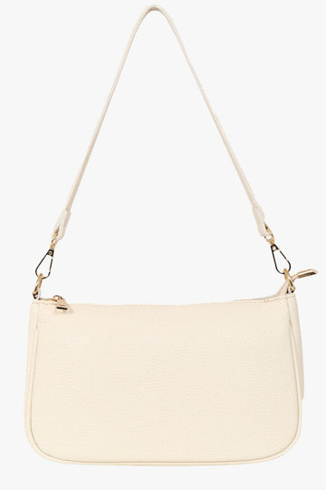 cream coloured leather baguette bag with detachable strap and zip closure