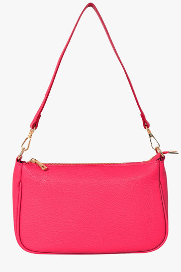 vibrant pink leather baguette clutch bag