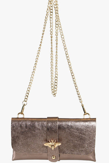 champagne rose gold shimmery clutch bag with a long detachable gold chain strap