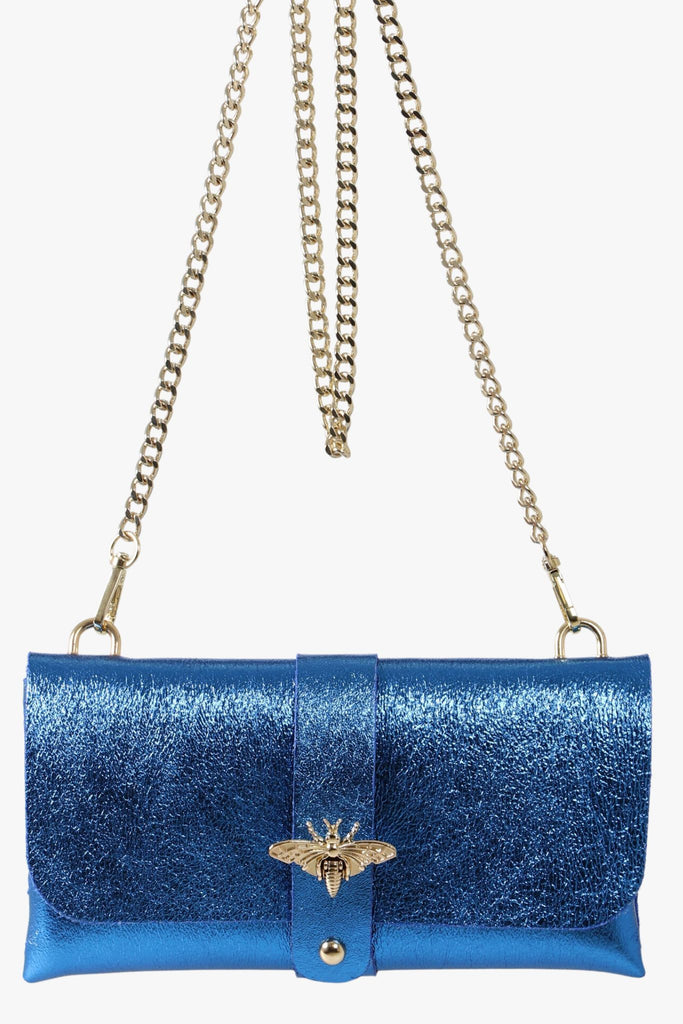 metallic blue leather clutch bag with a detachable gold chain strap and a gold bee clasp on the front