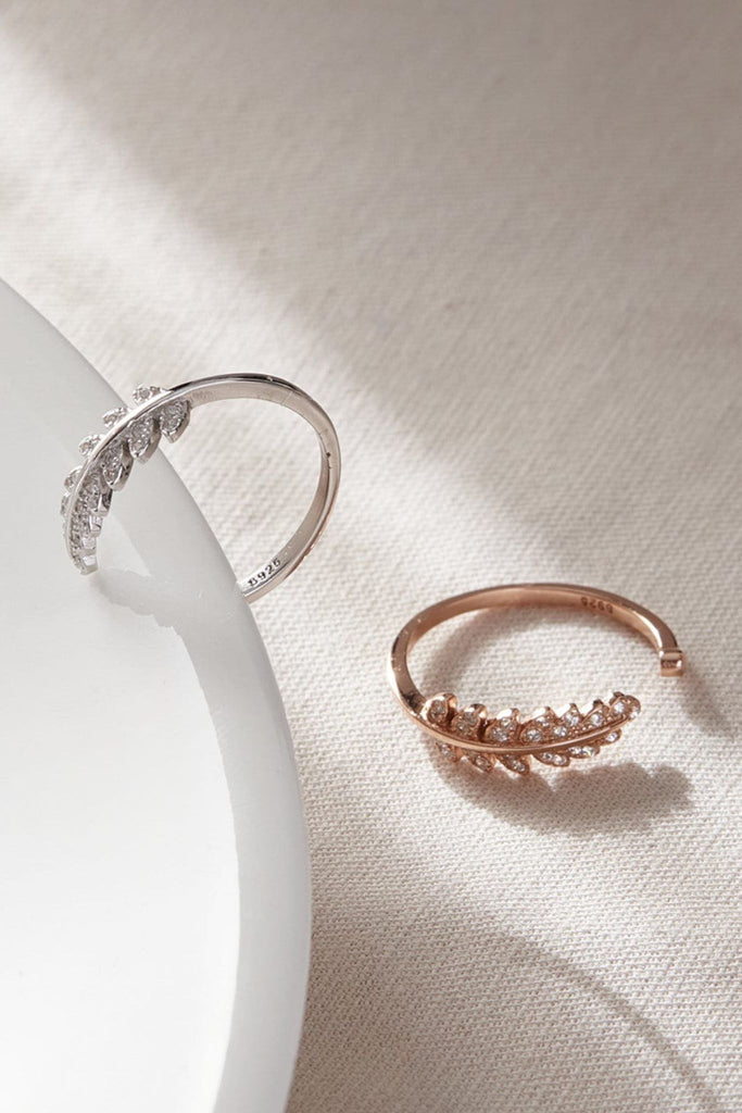 both silver and rose gold colourways, showing the shape of the leaf design and the open ring band
