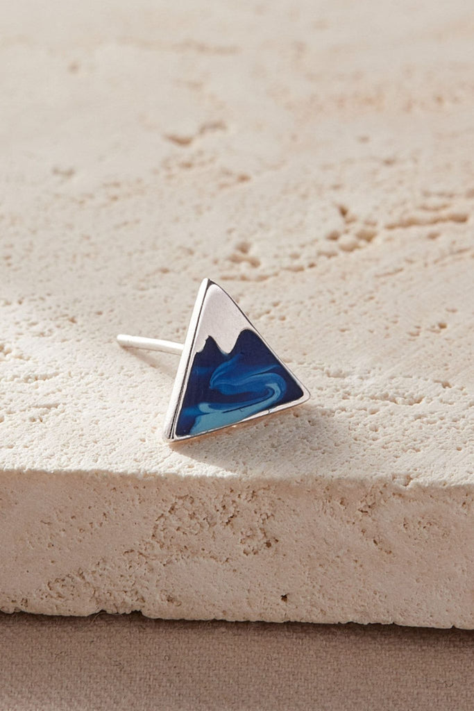 close up of a single earrings, showing the deep blue colour