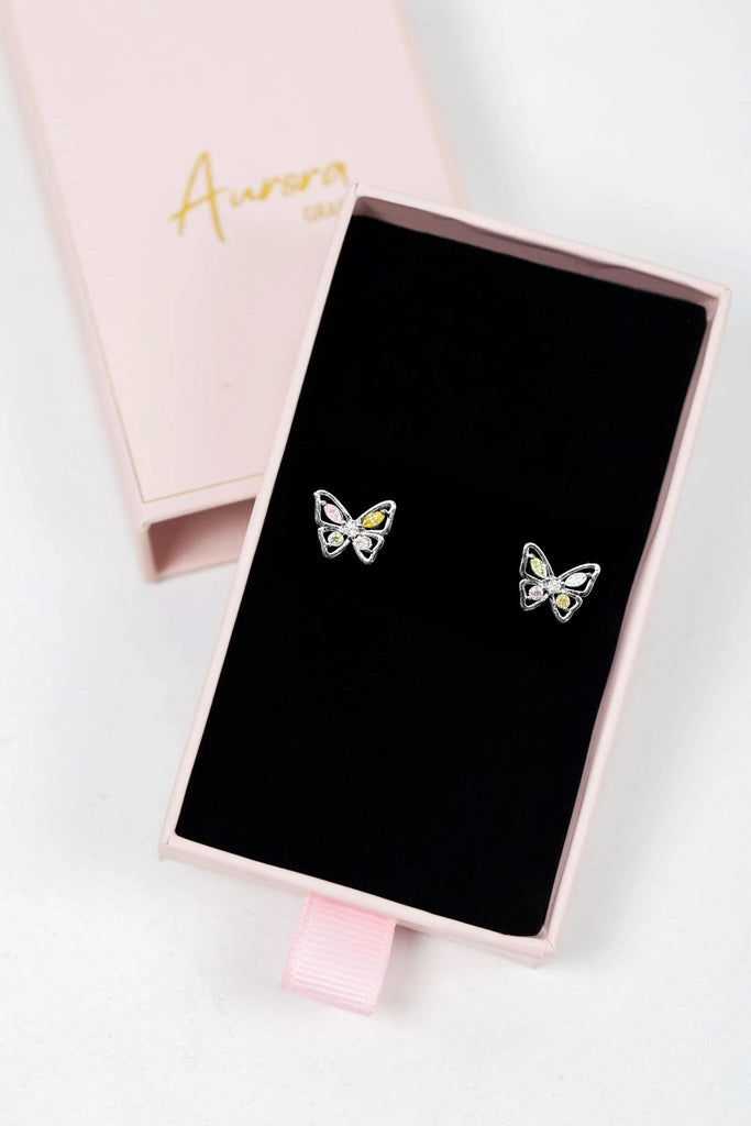 earrings being displayed in a gift box